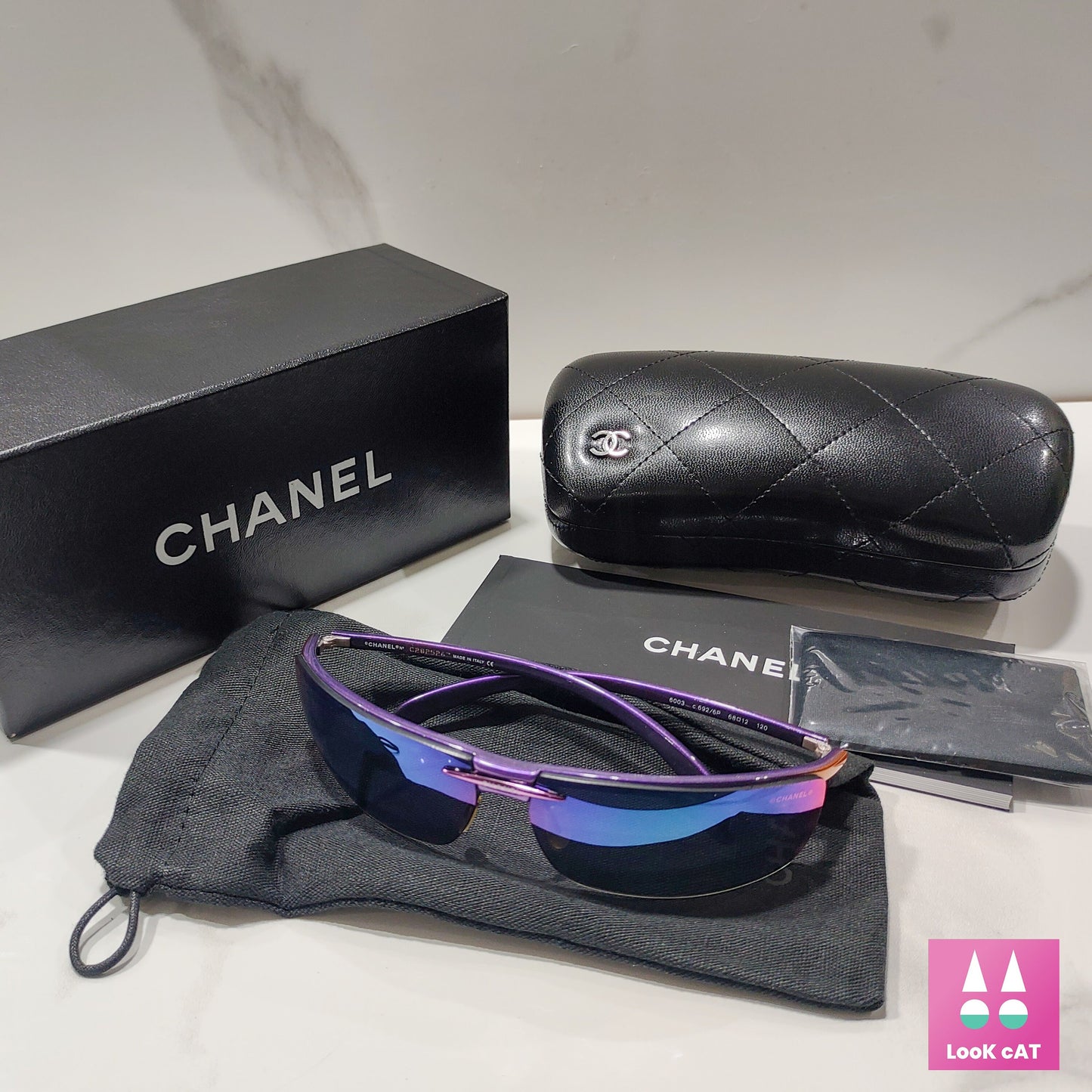 Occhiali da sole Chanel modello 6002 senza montatura lunetta brille tonalità verde y2k