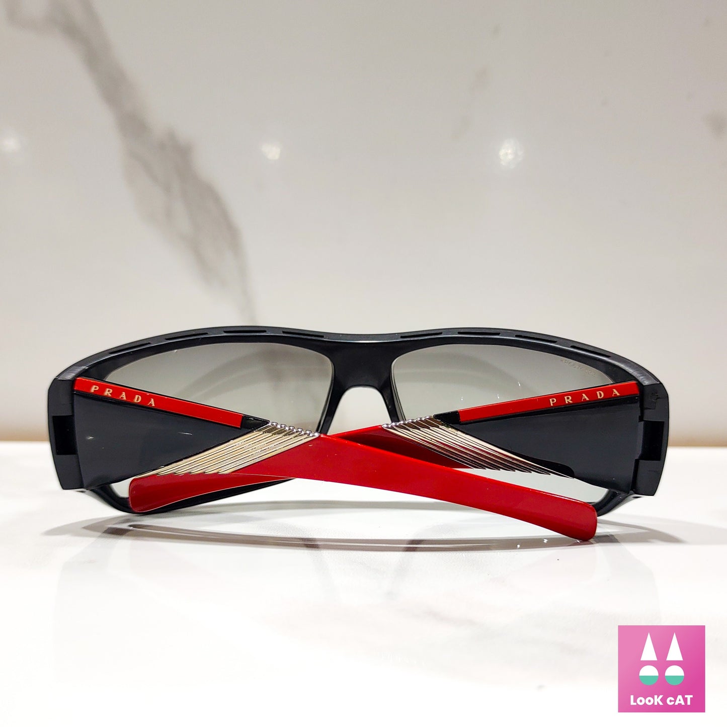 Occhiali da sole Prada modello SPS 06H lunette brille y2k shades