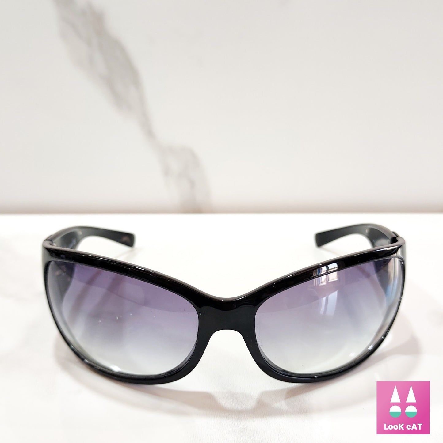 Occhiali da sole Prada modello SPR 03G con fiamma avvolgente lunette brille sfumature y2k